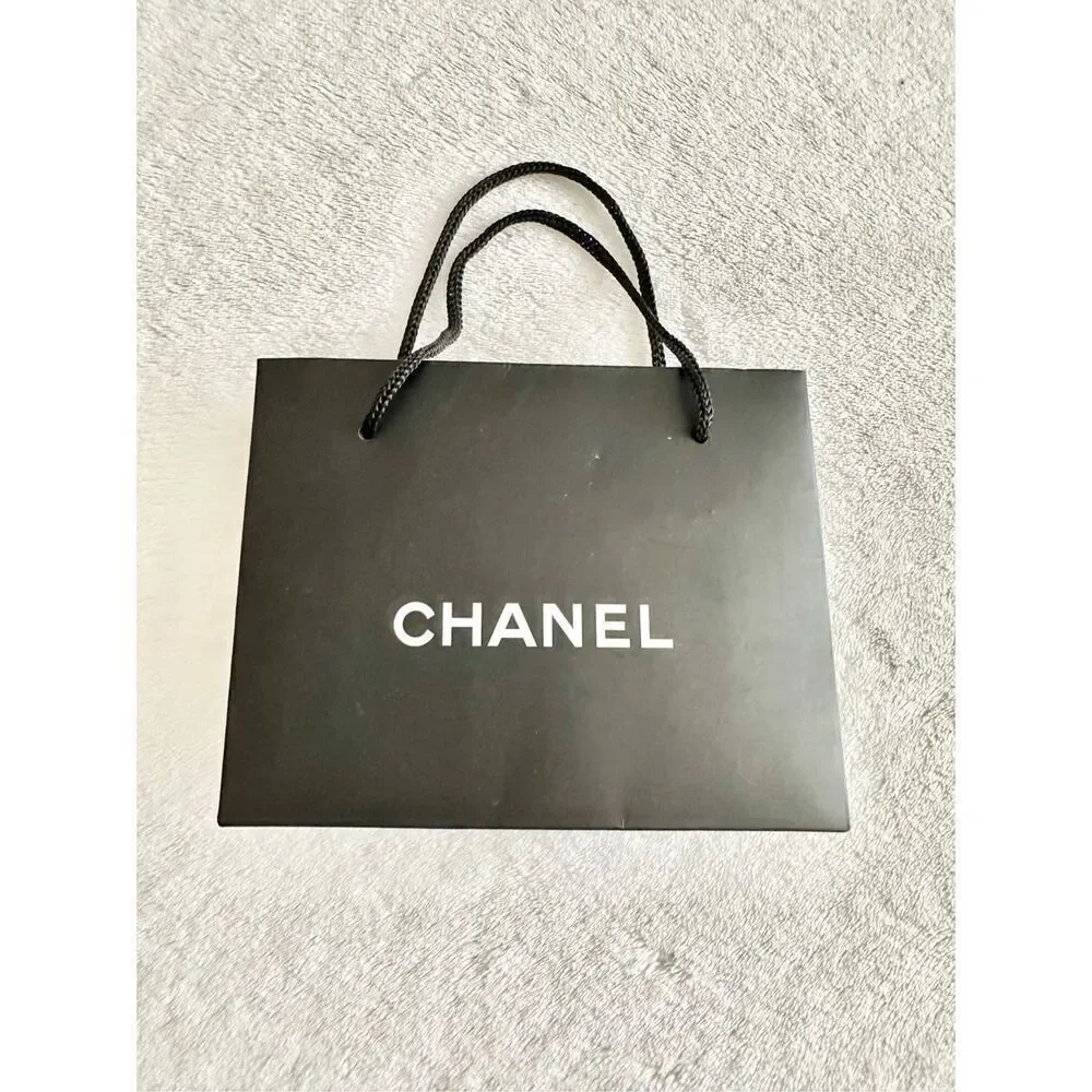 Small black Chanel gift bag ￼